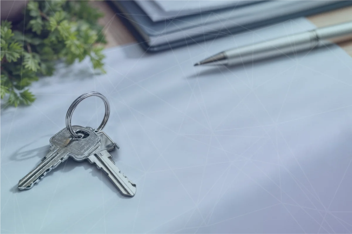 Keys and a pen on project documents